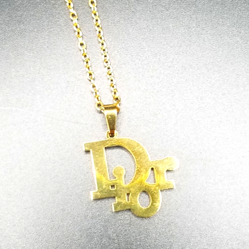 Dior Gold Zip Pull Pendant Charm Added To A Chain Necklace